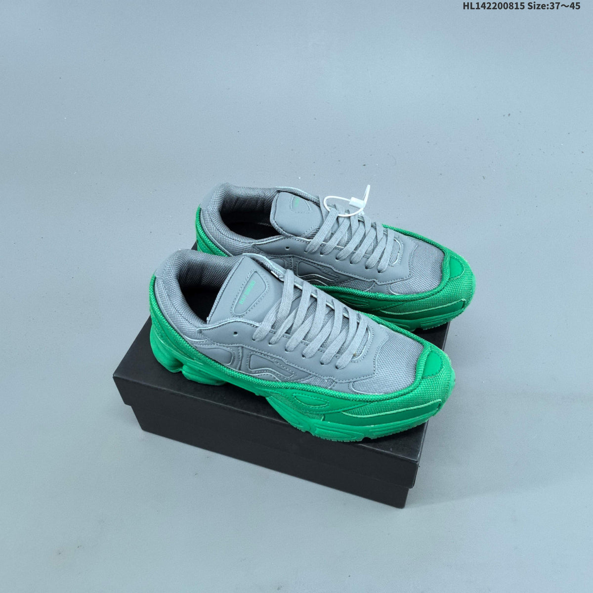 Raf Simons x adidas Ozweego III Retro Sneakers for Running - product image from the listing.