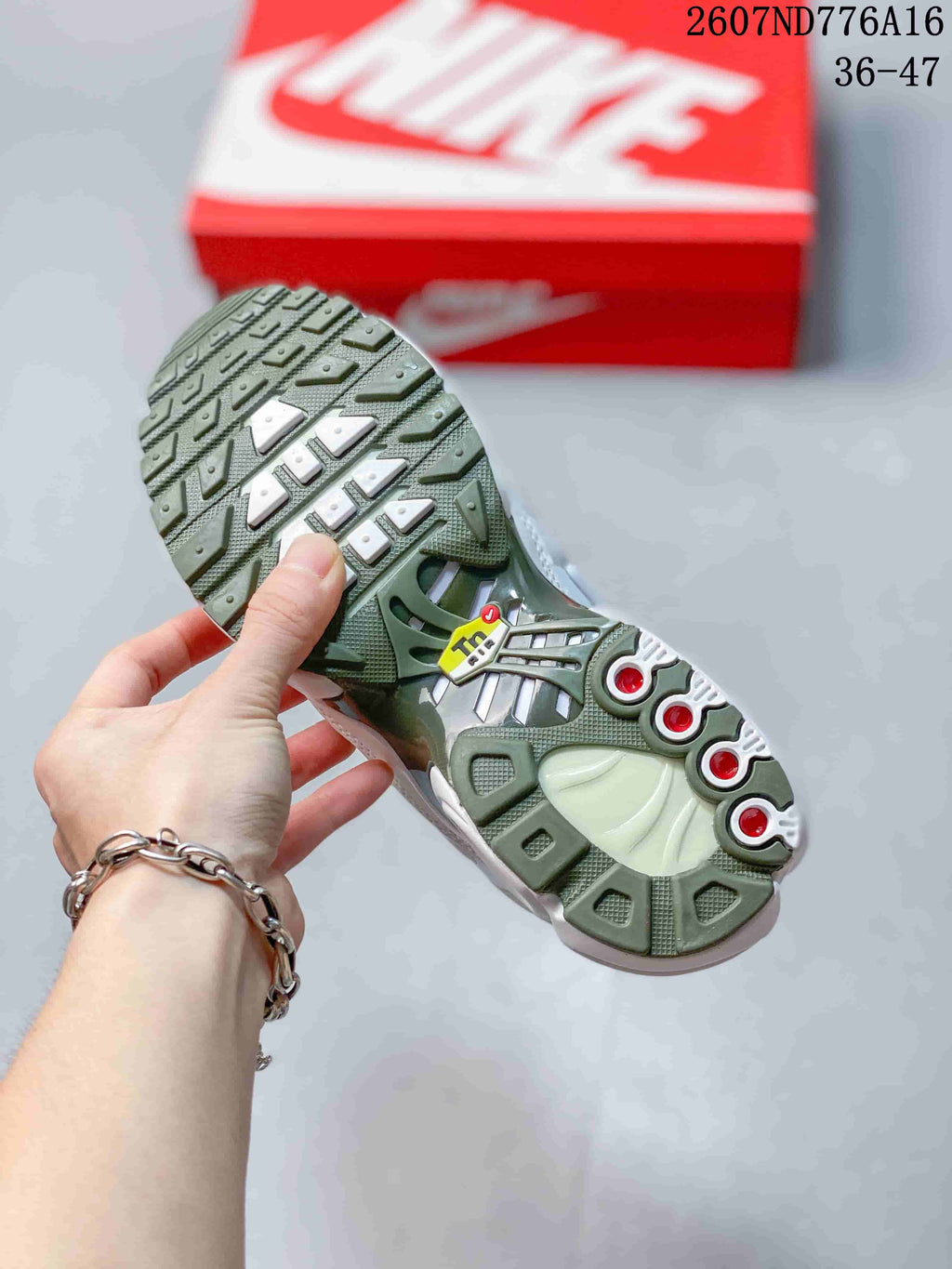 Nike Air Max Plus Sneakers in White and Green 2607ND776A16 - product image from the listing.