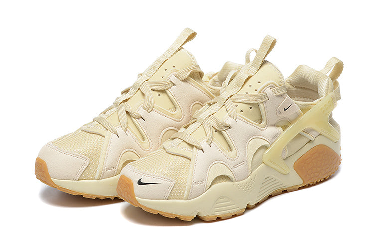 Nike Air Huarache Run Sneakers in Cream and Gum - product image from the listing.