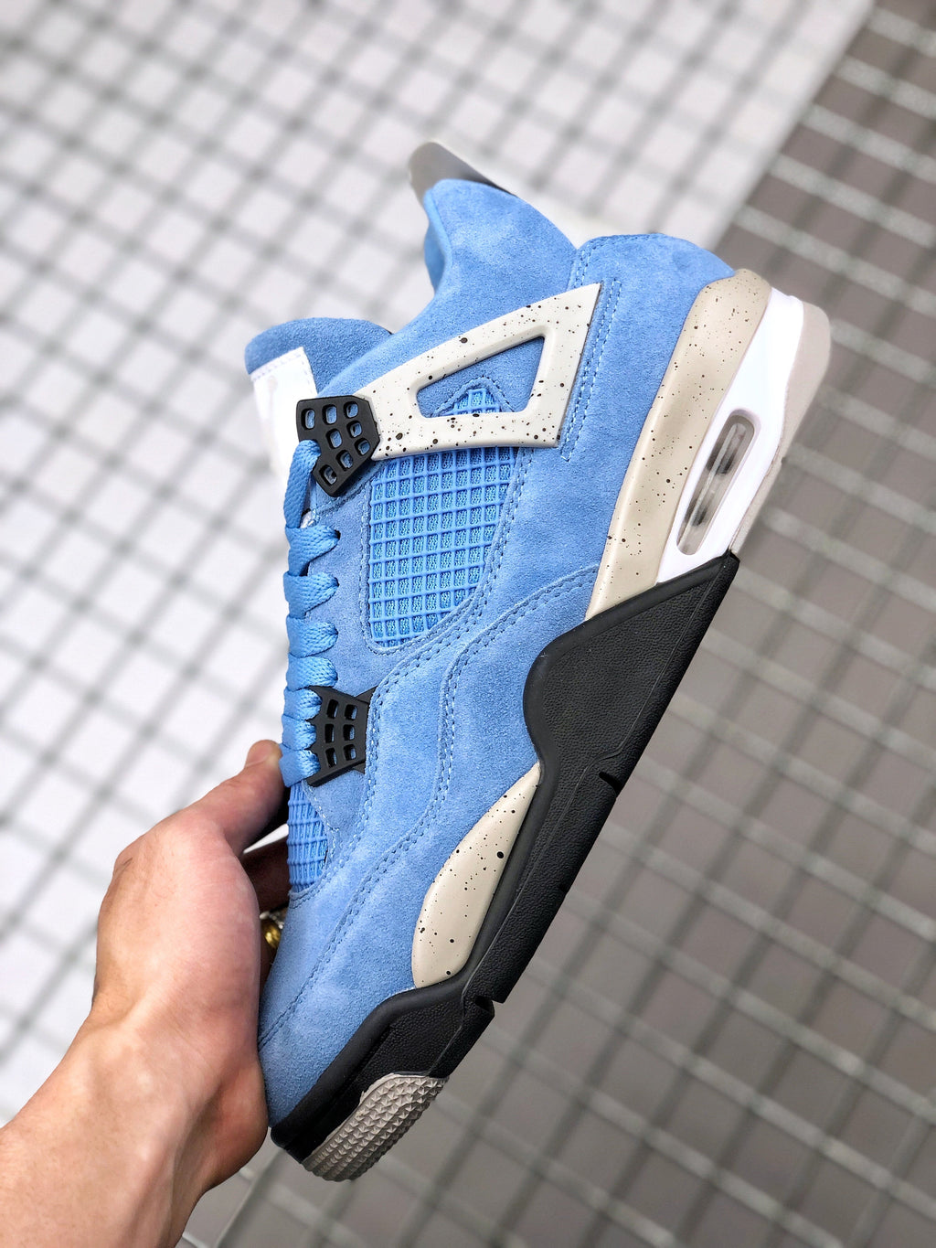Air Jordan 4 University Blue Sneakers CT8527-400 - product image from the listing.