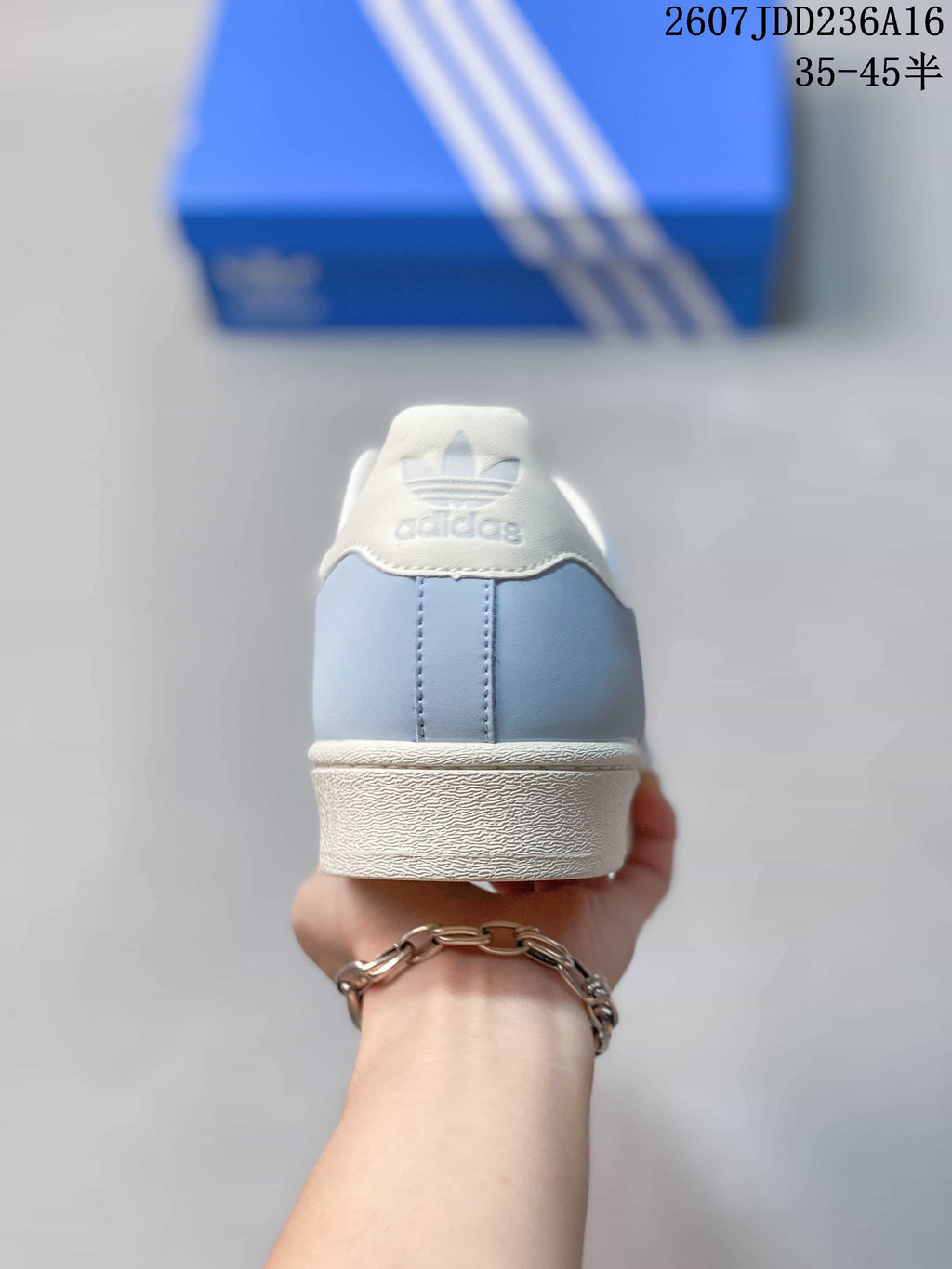 adidas Superstar Sneakers in Light Blue and White JDD236A16 - product image from the listing.