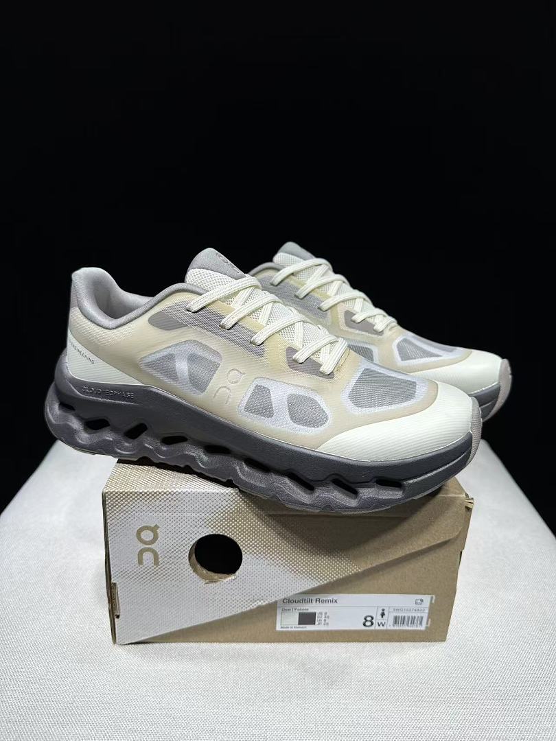 On Cloudtilt Remix Trainers in White and Pebble - product image from the listing.