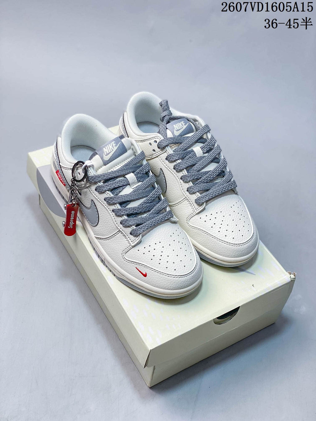Nike SB Dunk Low LV-Pattern Sneakers in White Grey - product image from the listing.