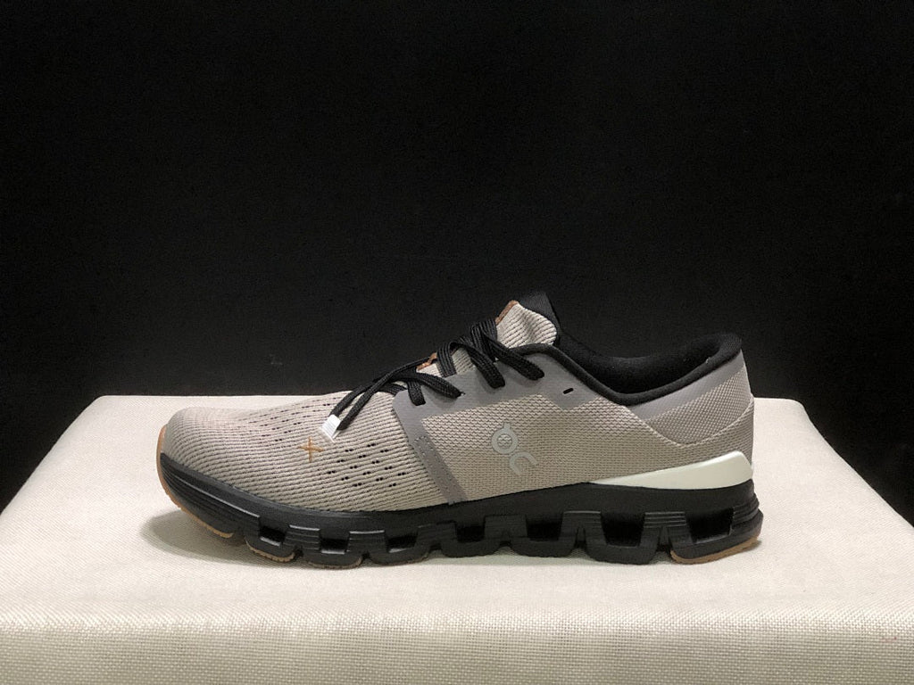 On Cloud X 4 Sneakers in Fog and in Black - product image from the listing.