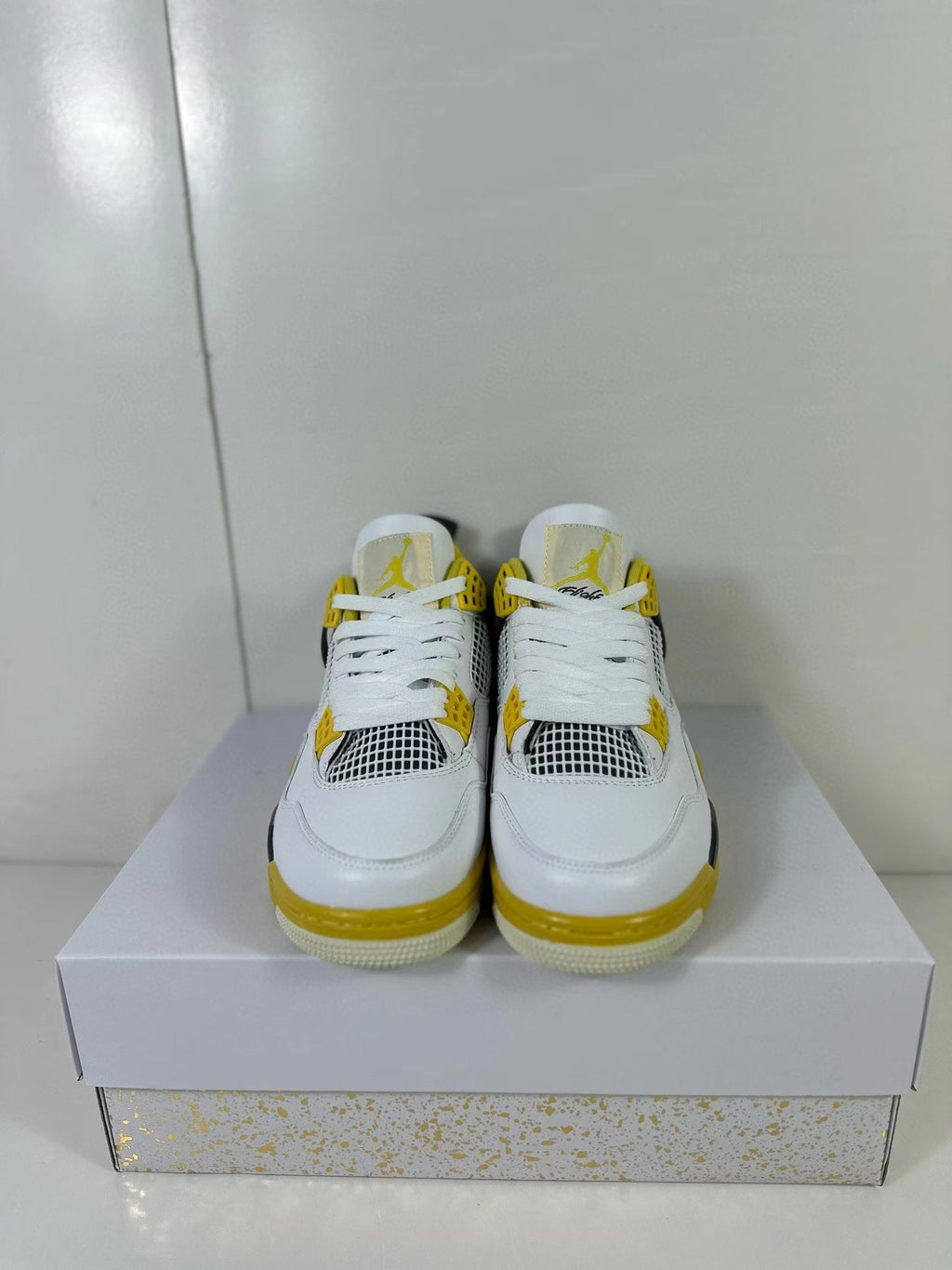 Air Jordan 4 Vivid Sulfur Sneakers White Yellow AQ9129-101 - product image from the listing.
