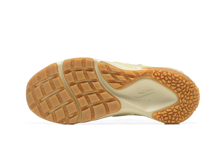 Nike Air Huarache Run Sneakers in Cream and Gum - product image from the listing.