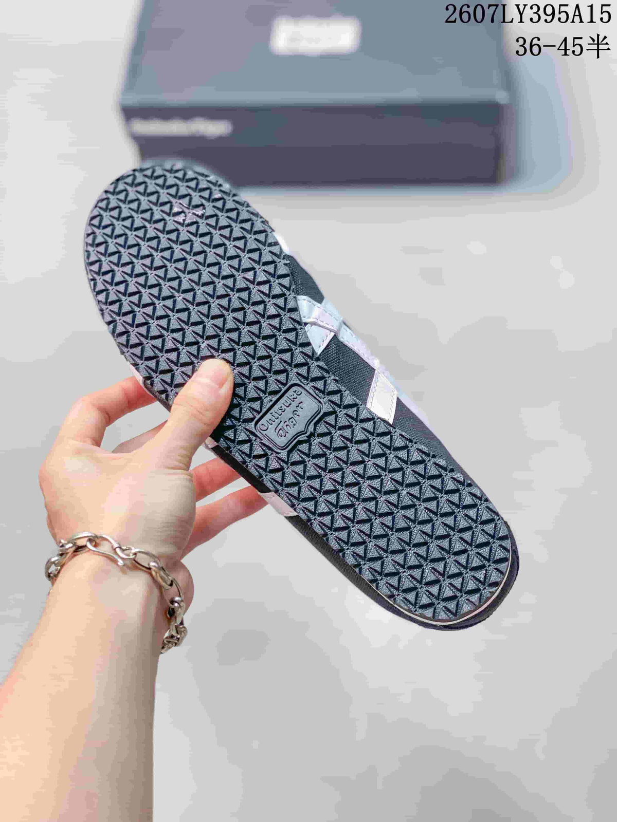 Onitsuka Tiger Mexico 66 Deluxe Sneakers in Black White 2607LY395A15 - product image from the listing.