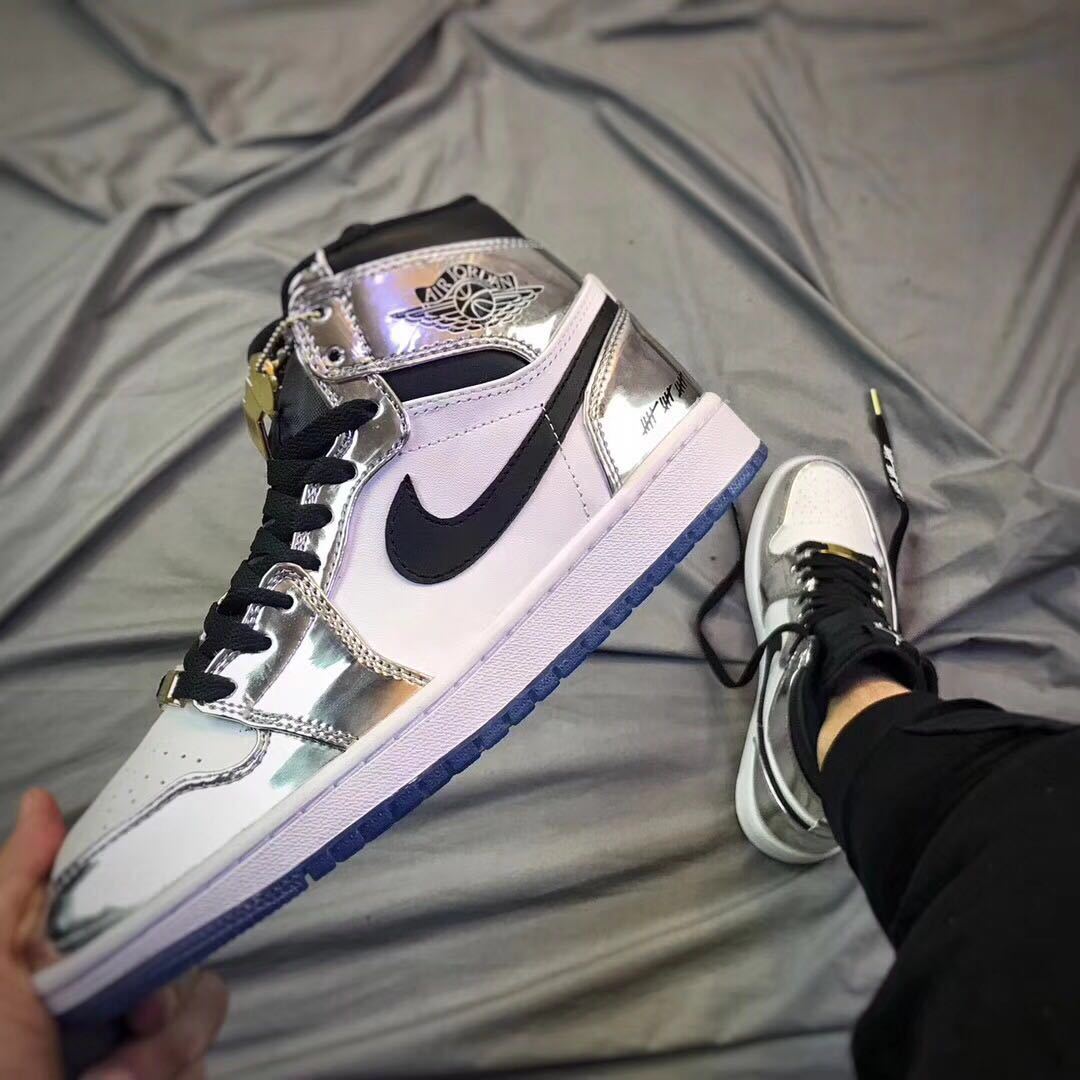 Air Jordan 1 Pass The Torch High-Top Sneakers Silver White - product image from the listing.