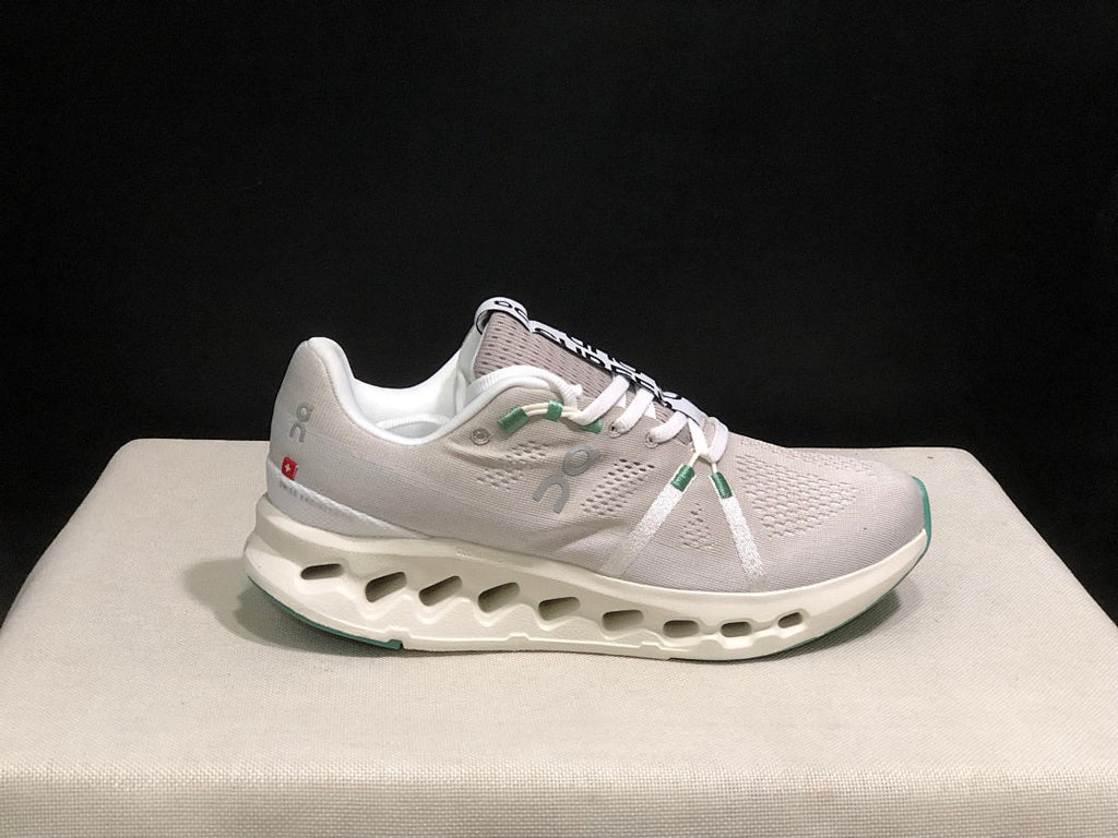 On Cloudsurfer Running Shoes in Pearl Ivory - product image from the listing.