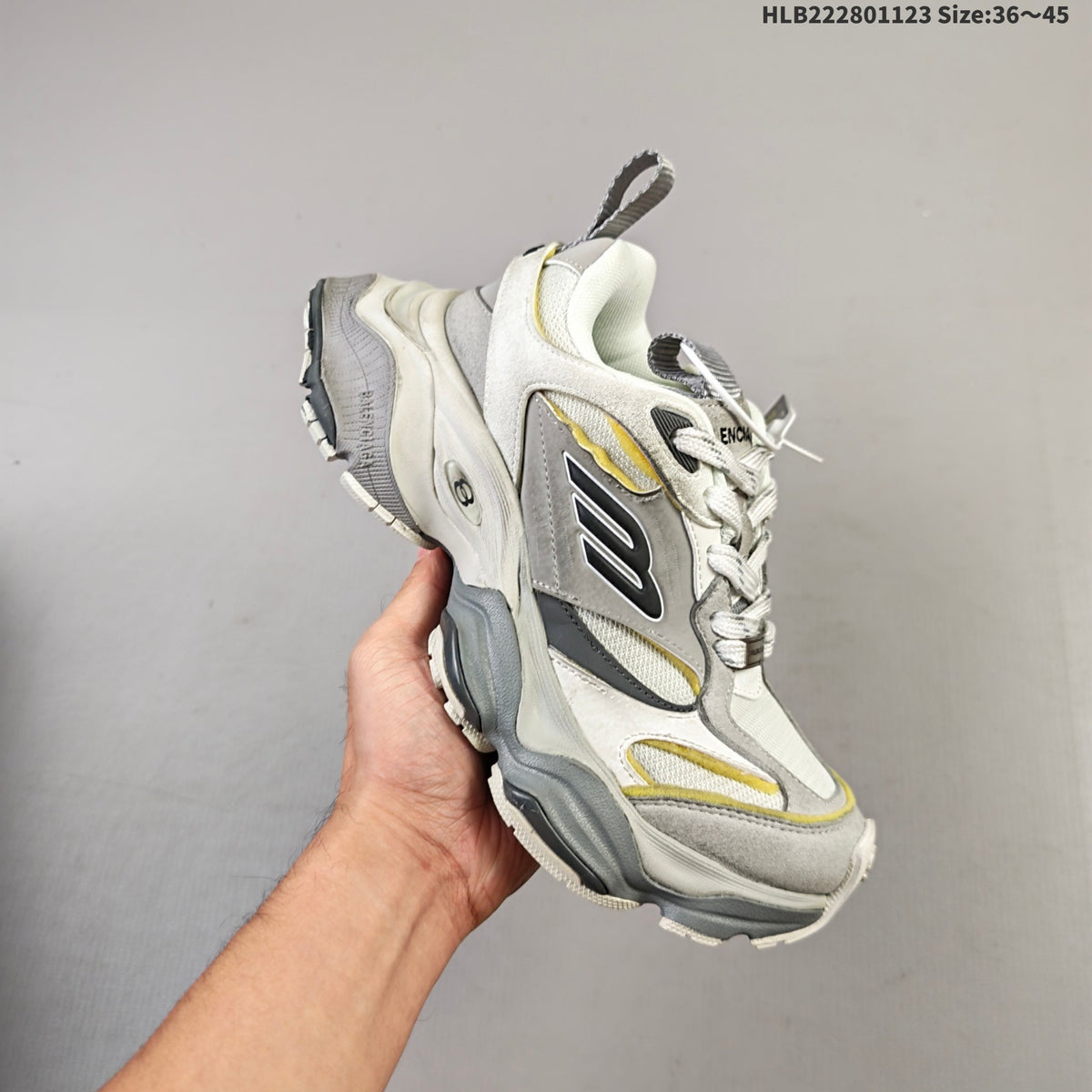 Gray and White Balenciaga Monday Low-Top Sneakers - product image from the listing.