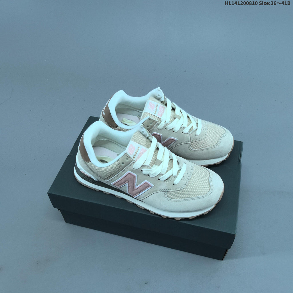 New Balance 574 Retro Sneakers in Black, Grey or in Cream - product image from the listing.