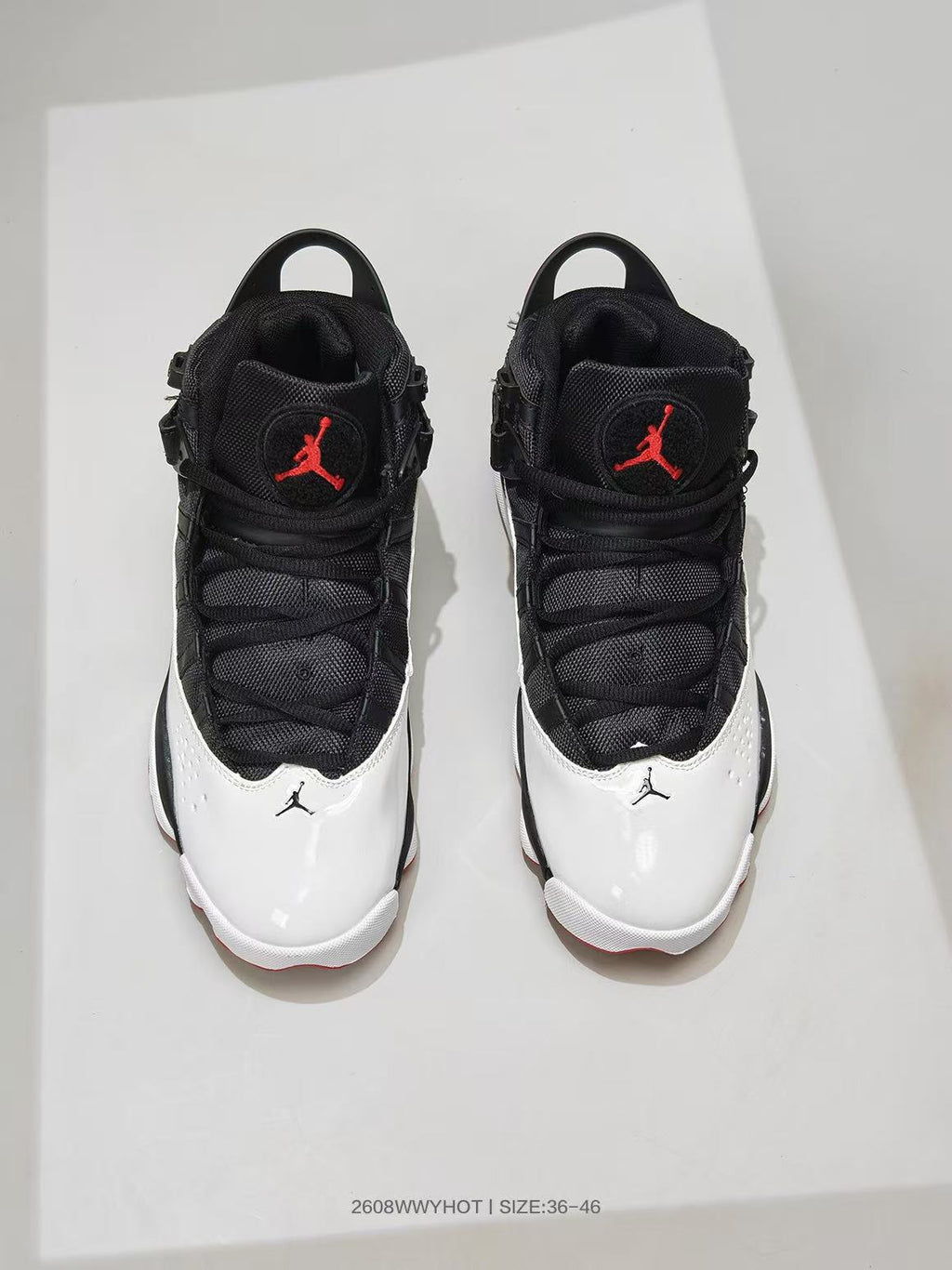 Jordan 6-12 Sneakers in Black White Red - product image from the listing.