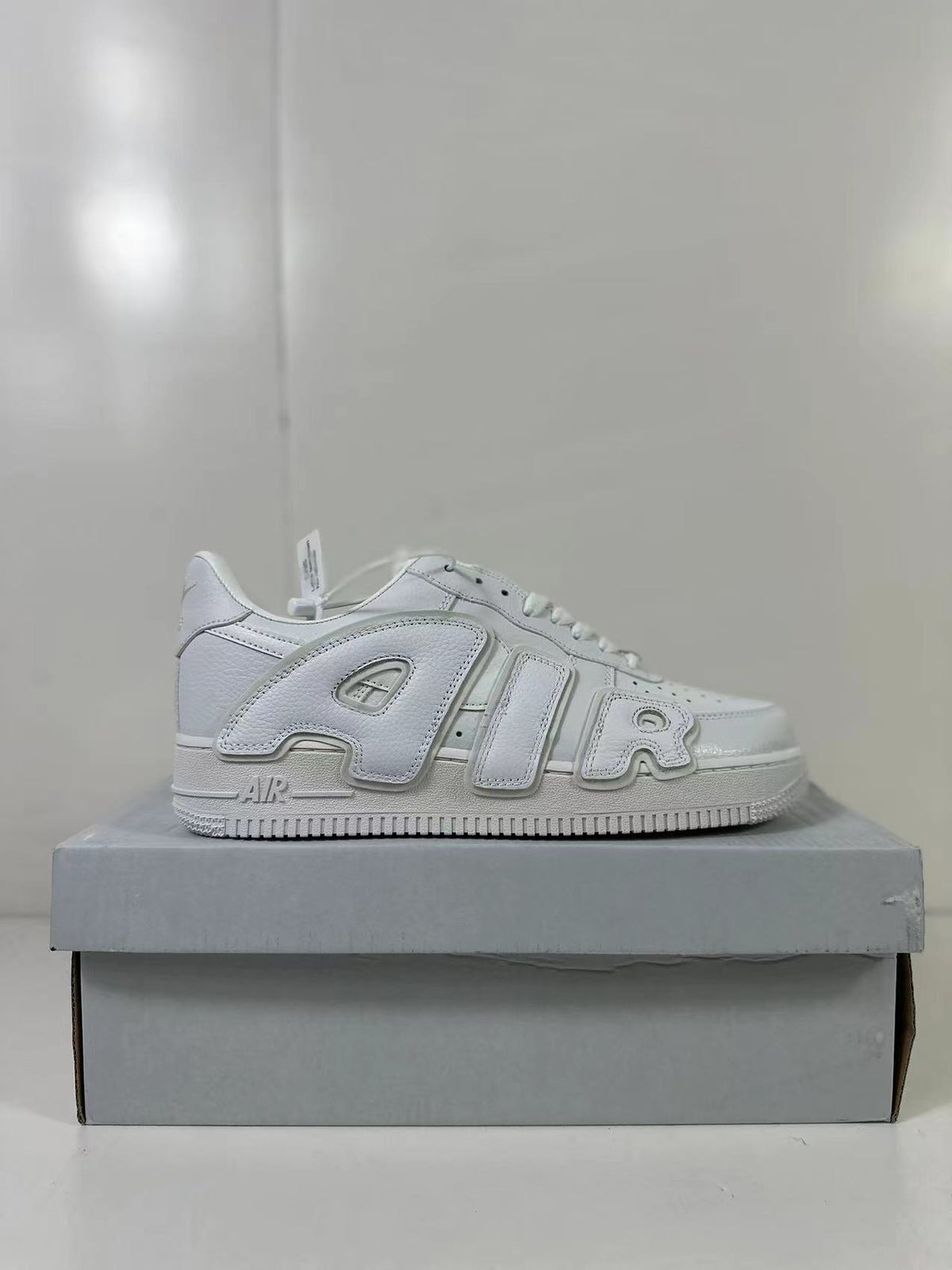 Nike Air Force 1 Low CPFM Sneakers in White DD7050-100 - product image from the listing.