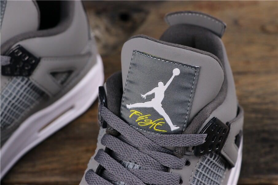 Air Jordan 4 Cool Grey Sneakers 308497-007 - product image from the listing.