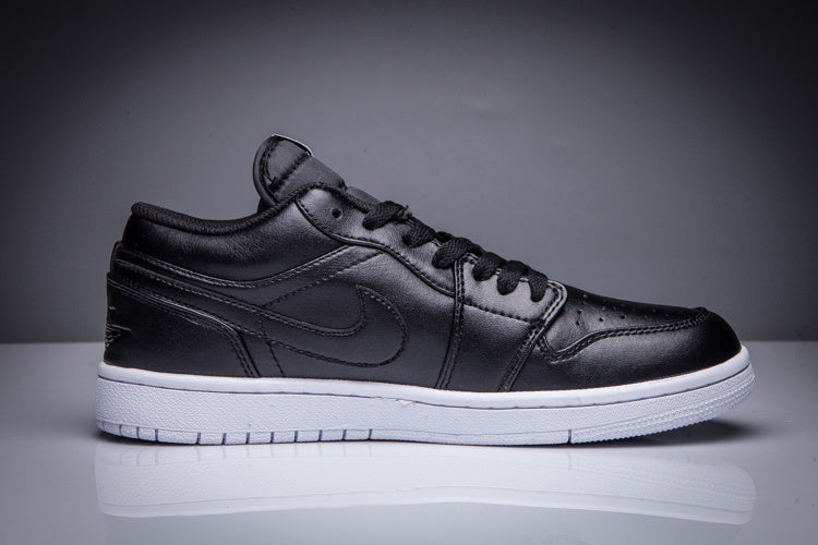 Air Jordan 1 Low Black and White Sneakers - product image from the listing.