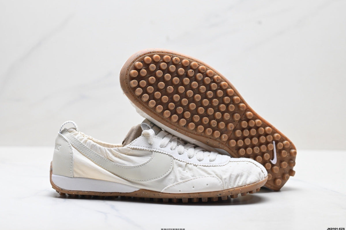 White Jacquemus x Nike Jacumoon Sneakers - product image from the listing.