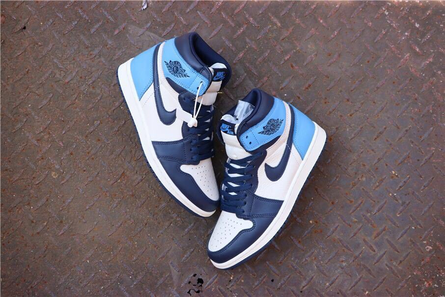 Air Jordan 1 Retro High OG Sneakers in Blue and White - product image from the listing.