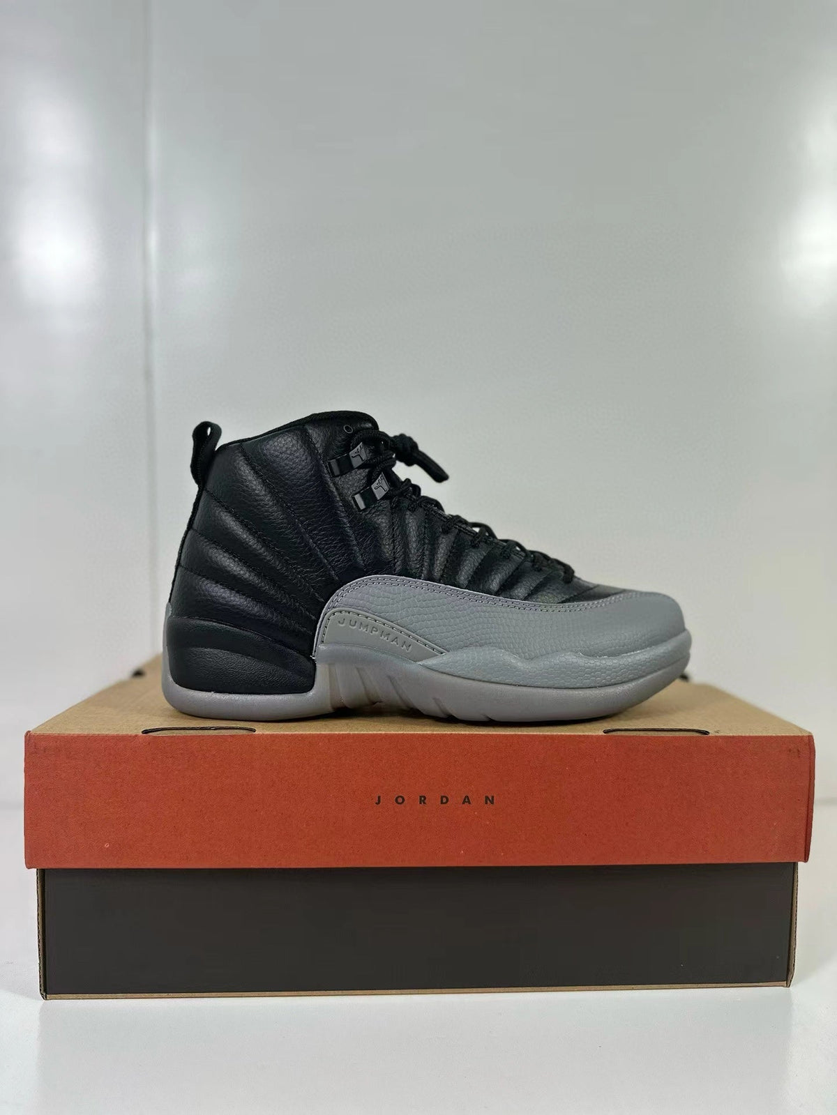 Air Jordan 12 Retro Black Wolf Grey CT8013-019 - product image from the listing.