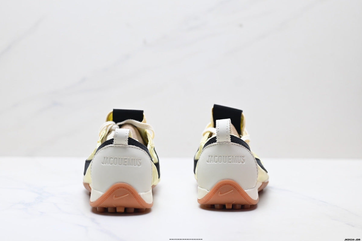 Jacquemus x Nike Jacumoon Sneakers, in Light Yellow and Black - product image from the listing.