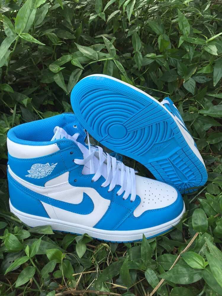 Blue and White Air Jordan 1 High Sneakers - product image from the listing.