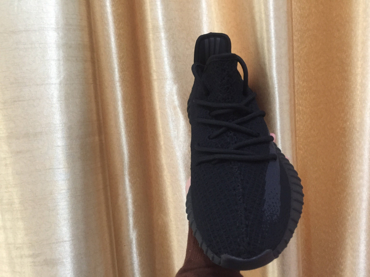 Adidas Yeezy Boost 350 V2 Sneakers in Black Knit - product image from the listing.