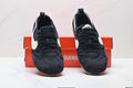 Jacquemus x Nike Jacumoon Sneakers in Black and White - product image from the listing.