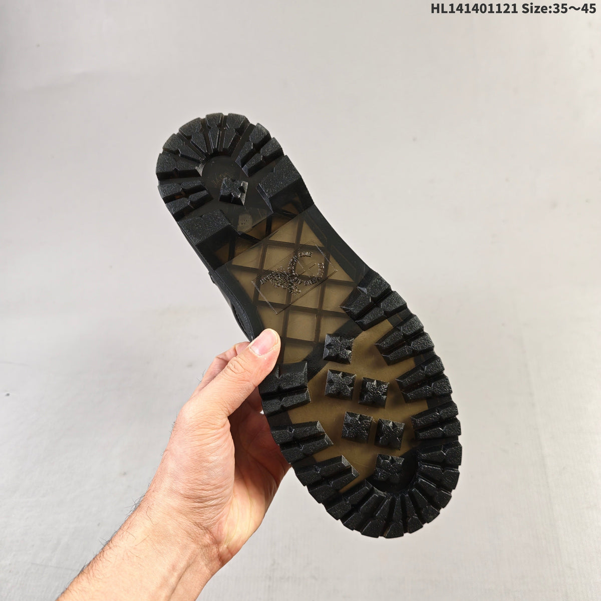 1057 Black Platform Lace-Up Boots by Dr. Martens - product image from the listing.