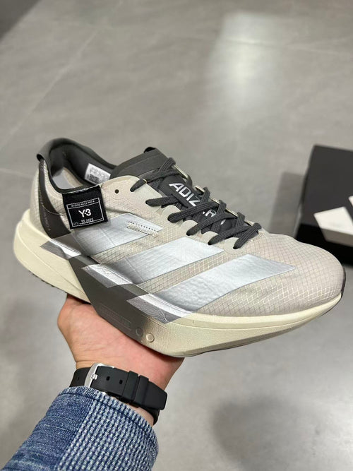 adidas Adizero Adios Pro 4 Running Shoes in White Black - product image from the listing.