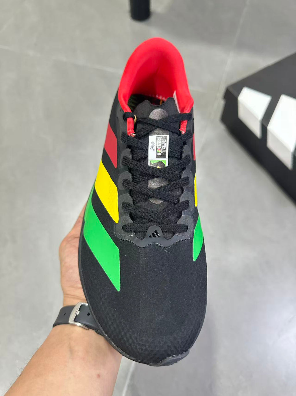 Adidas Lightstrike Pro Running Shoes, in Black Green Yellow Red KJ6160 - product image from the listing.