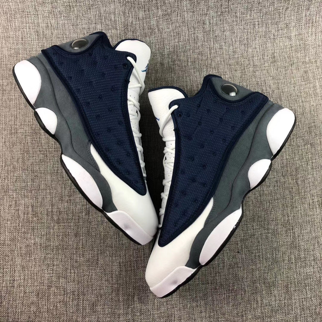 Air Jordan 13 Flint Navy Sneakers 414571-404 - product image from the listing.