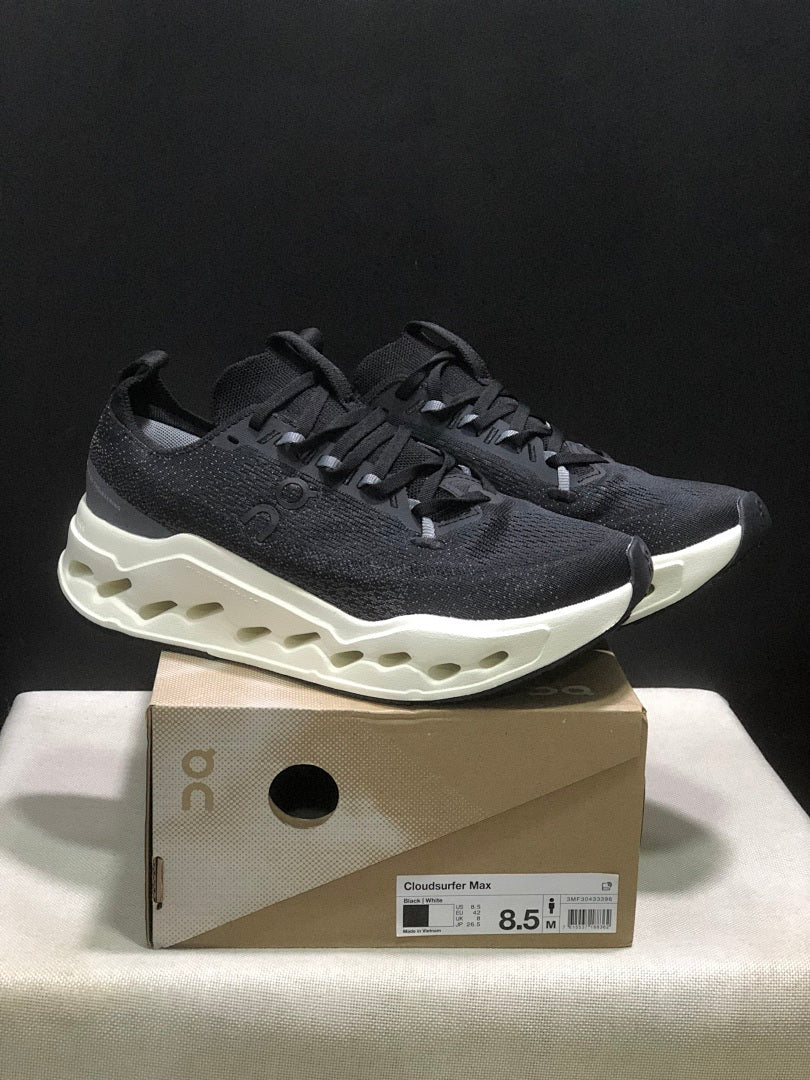 On Cloudsurfer Max Running Sneakers in Black and White - product image from the listing.