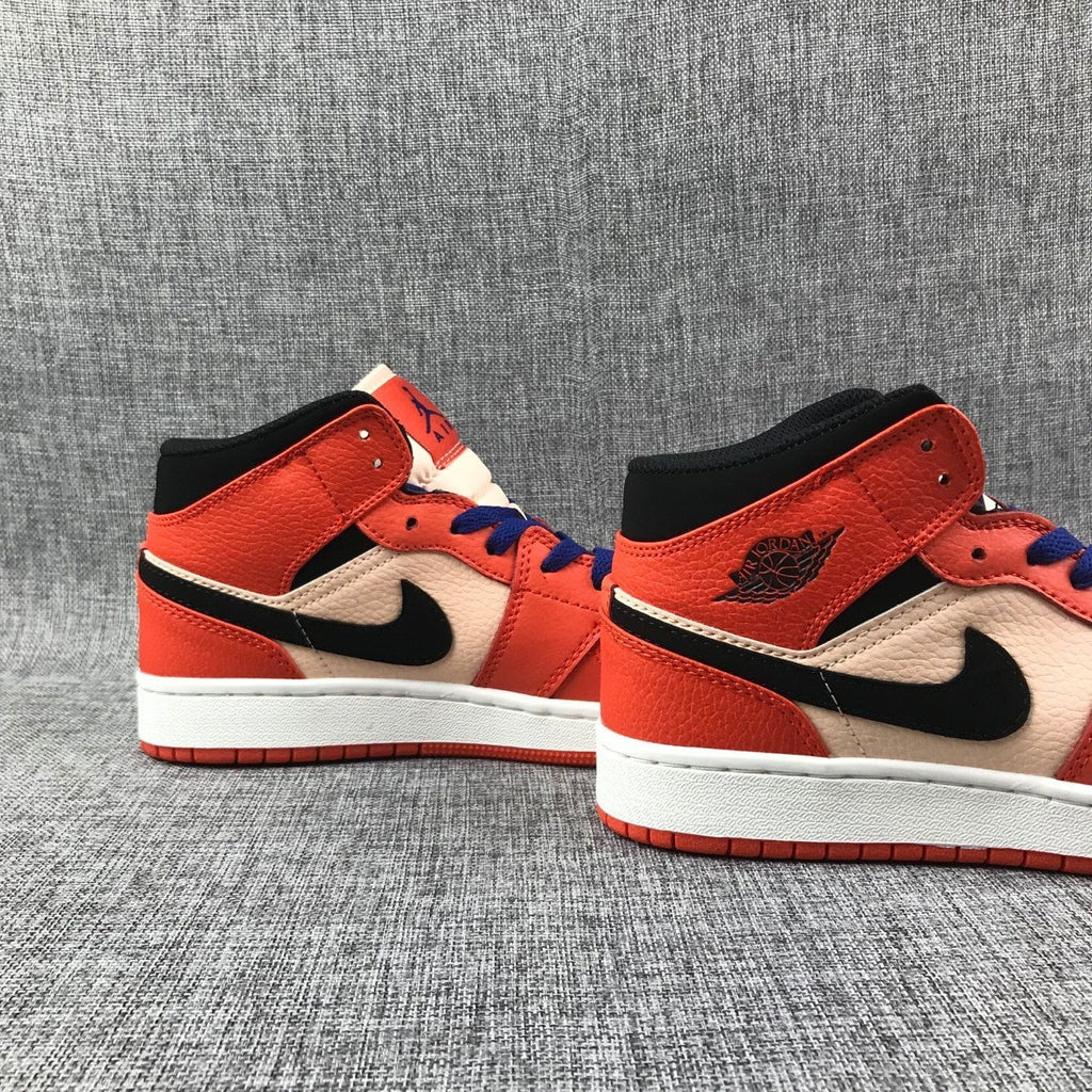 Air Jordan 1 Mid GS Sneakers in Pink and Orange - product image from the listing.