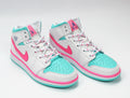 Jordan 1 Mid Sneakers in White Pink Turquoise 555112-102 - product image from the listing.