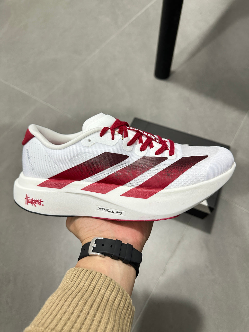 adidas Lightstrike Pro Running Shoes in White Red JQ2147 - product image from the listing.