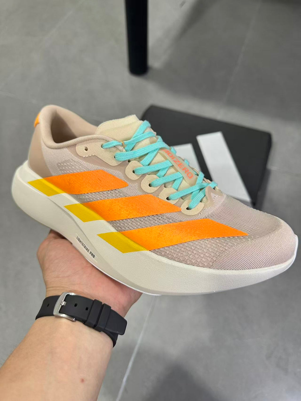 Adidas Lightstrike Pro Running Shoes, in Beige Orange - product image from the listing.
