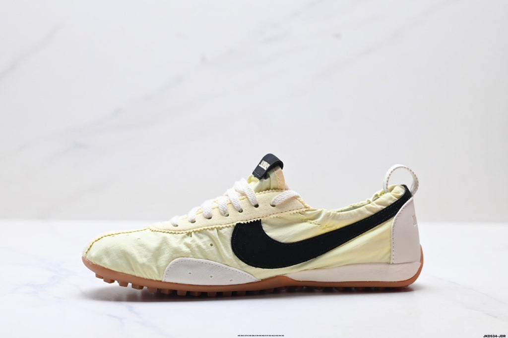 Jacquemus x Nike Jacumoon Sneakers, in Light Yellow and Black - product image from the listing.