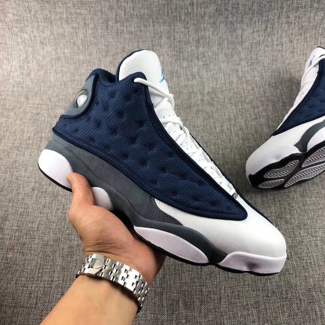 Air Jordan 13 Flint Navy Sneakers 414571-404 - product image from the listing.