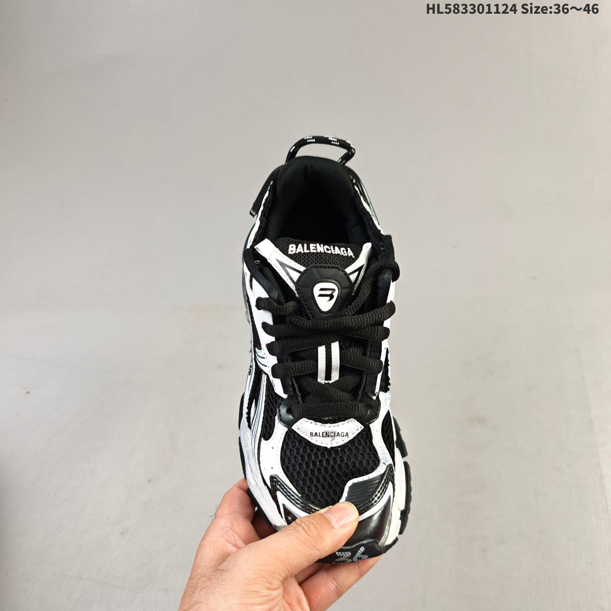Black and White Balenciaga Runner Low-Top Sneakers - product image from the listing.