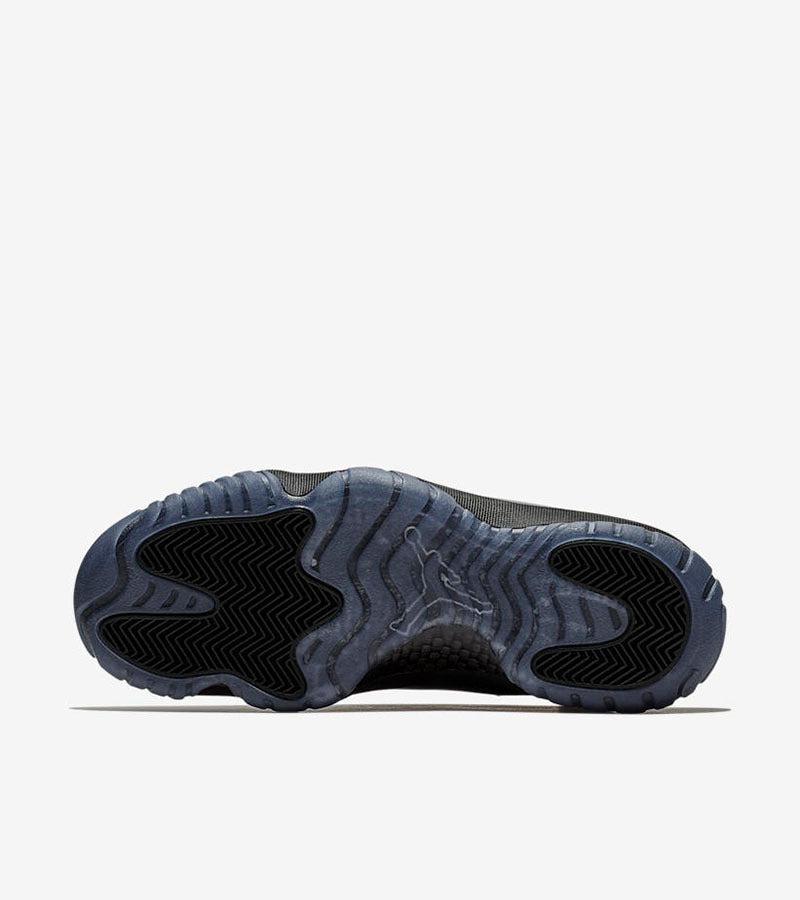 Air Jordan 11 Cap and Gown High-Top Sneakers in Black - product image from the listing.