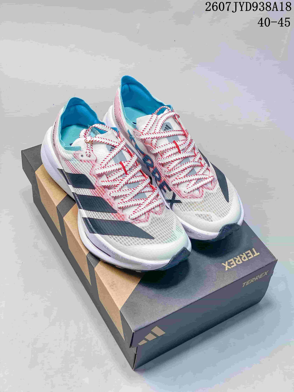 Adidas Adizero Evo SL 2 Running Shoes in White Pink Blue - product image from the listing.