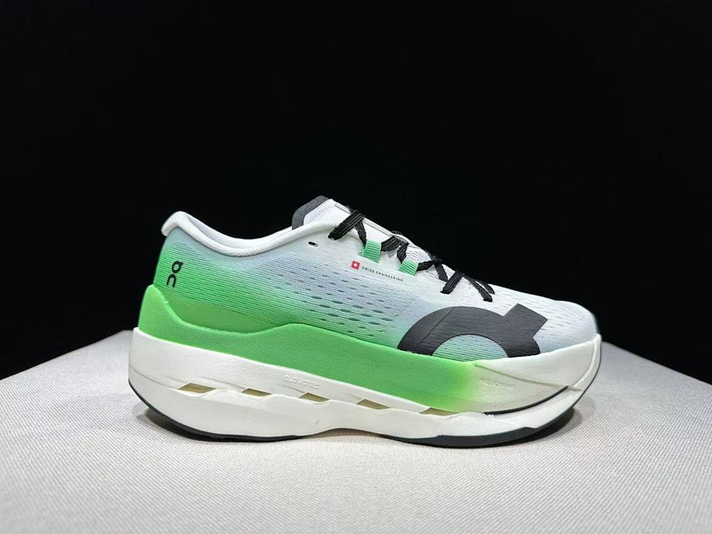On Cloudboom Max Running Shoes, in White and Green - product image from the listing.