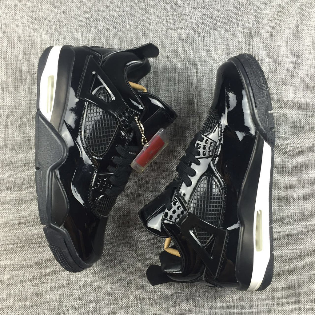 Air Jordan 4 Black Glossy Sneakers - product image from the listing.