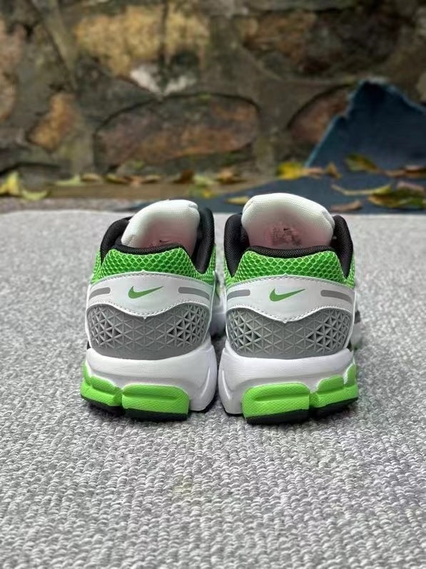 Nike Vomero 5 Sneakers in Black Green White - product image from the listing.