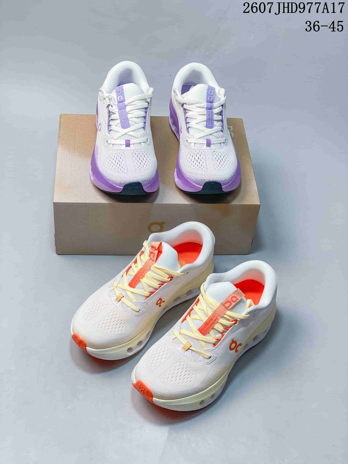 On Cloudtilt Trainers White with Purple or Orange Accents - product image from the listing.