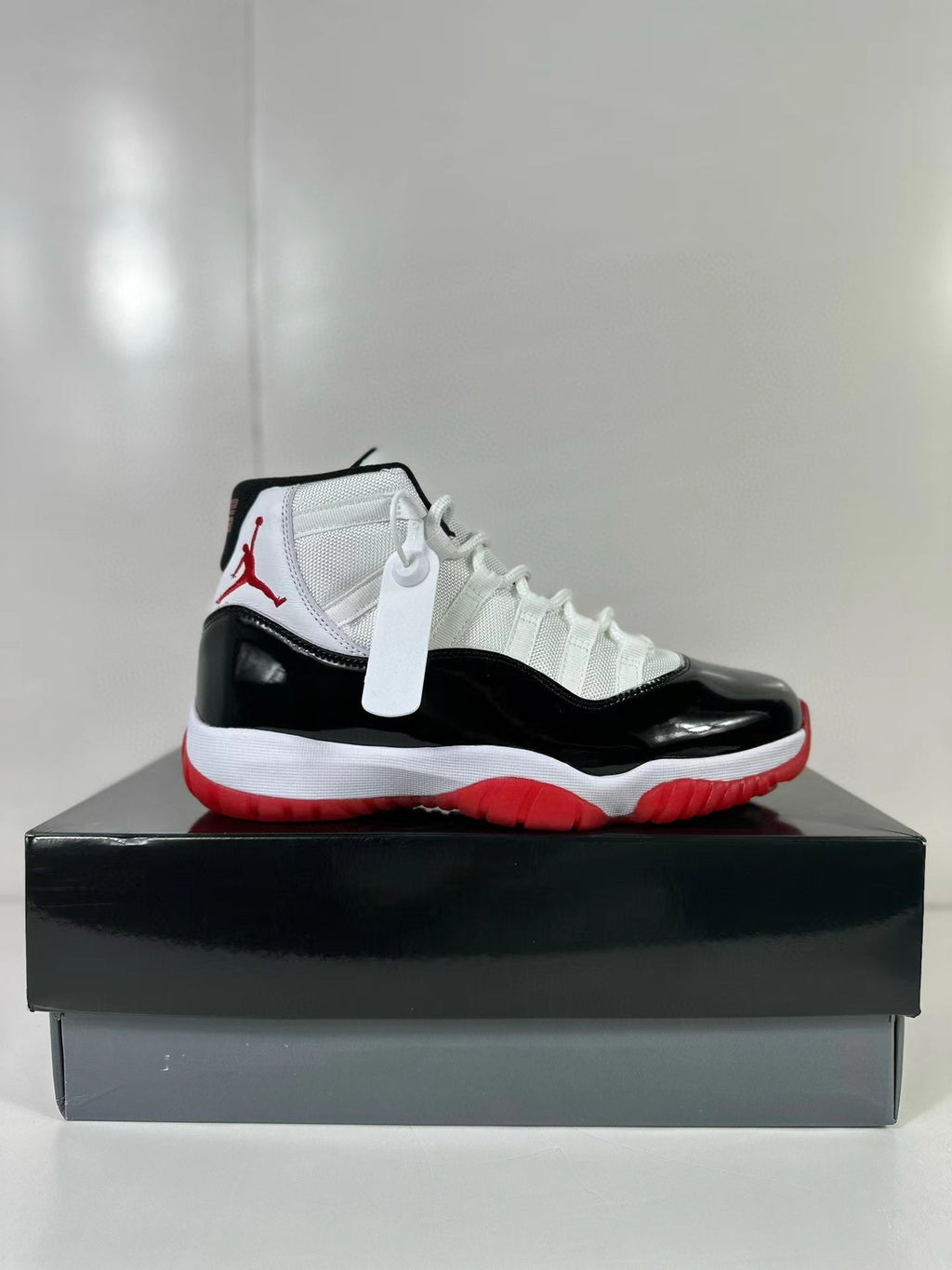 Air Jordan 11 Retro Concord Bred Sneakers CT8012-106 - product image from the listing.