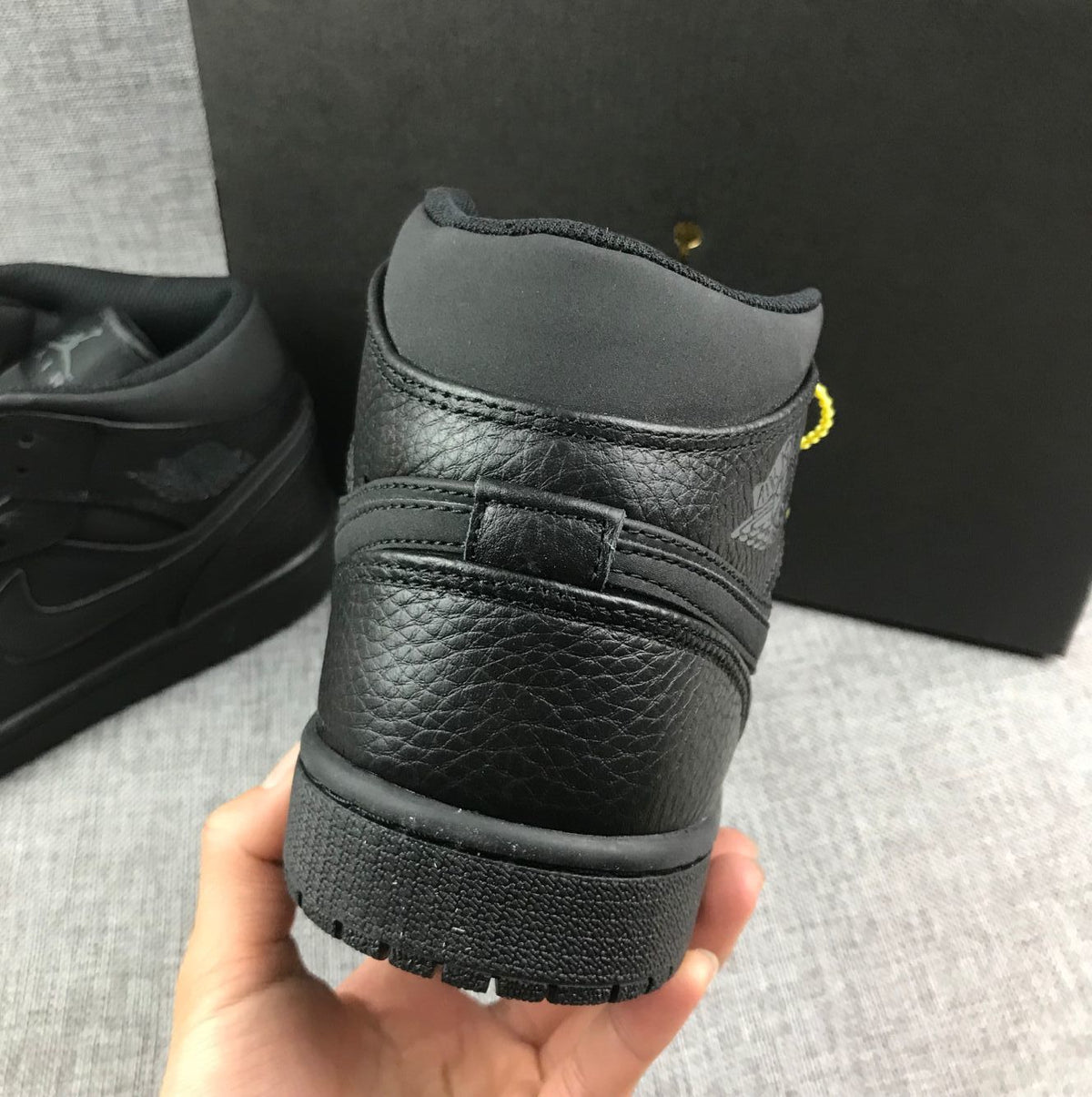 Air Jordan 1 Mid Sneakers, in Black - product image from the listing.