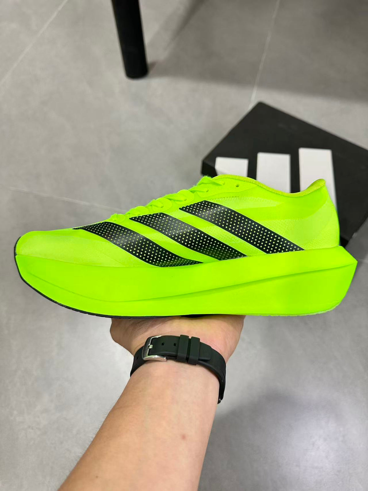 adidas Adizero Evo SL 2 Neon Running Shoes in Yellow - product image from the listing.