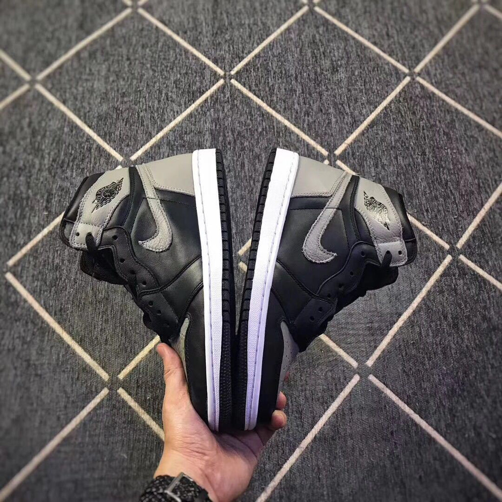 Air Jordan 1 High Shadow Sneakers in Black and Grey - product image from the listing.