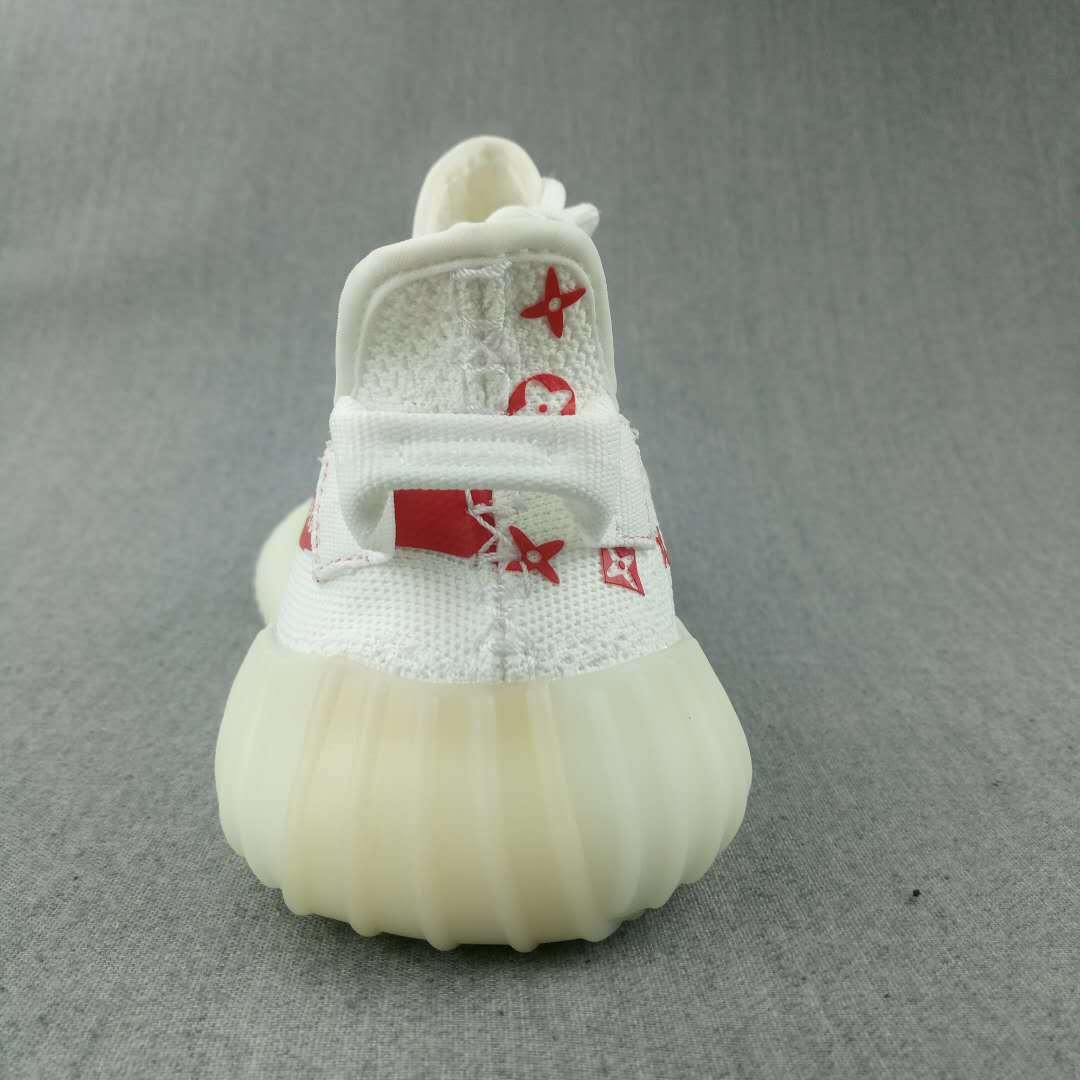 Yeezy 350 V2 Low-Top Sneakers in White and Red - product image from the listing.