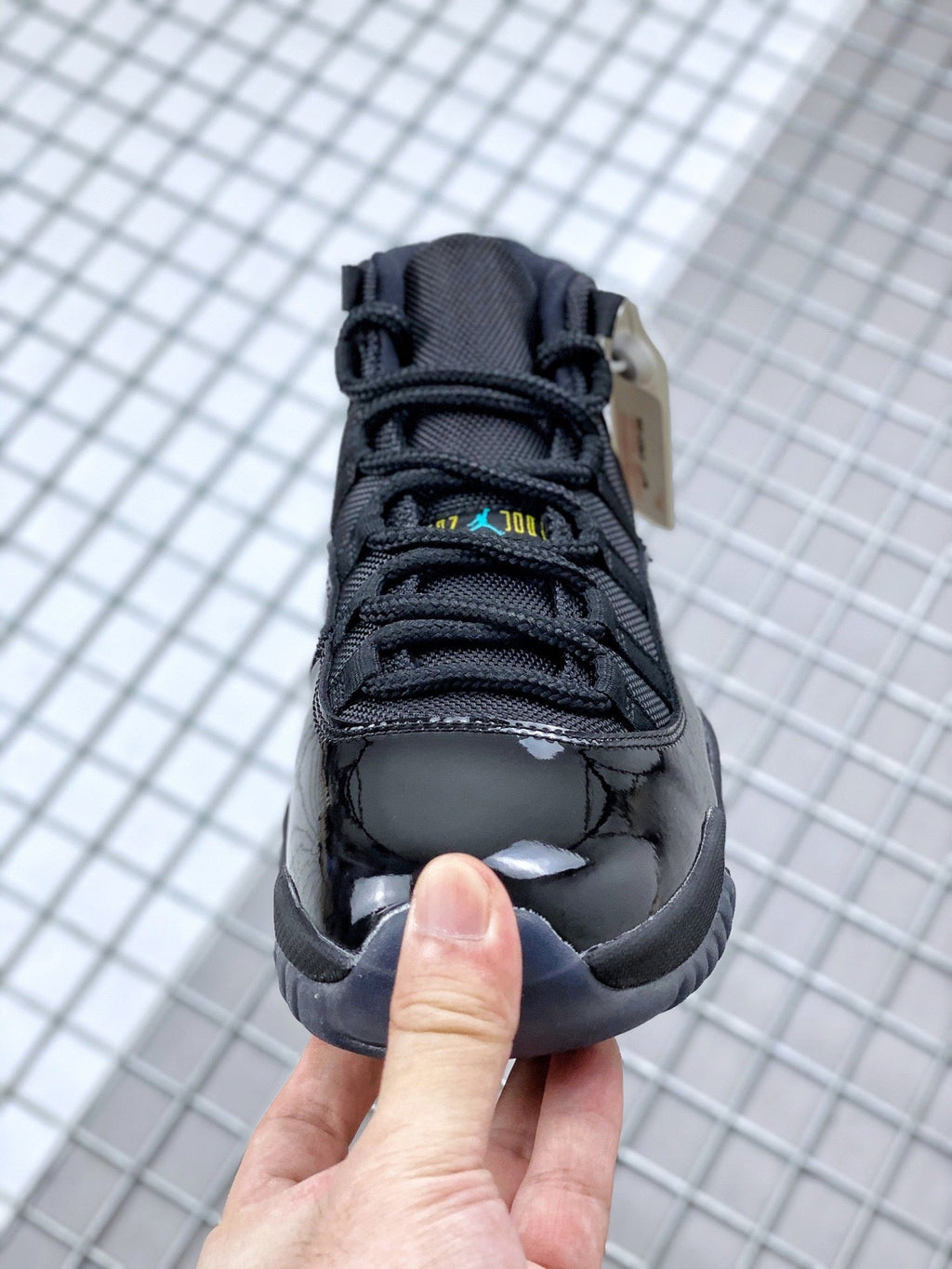 Air Jordan 11 Retro Gamma Black Sneakers 378037-006 - product image from the listing.